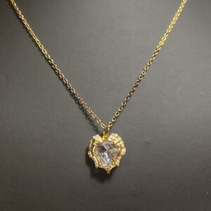 Elegant Gold and Silver Heart Pendant Necklace